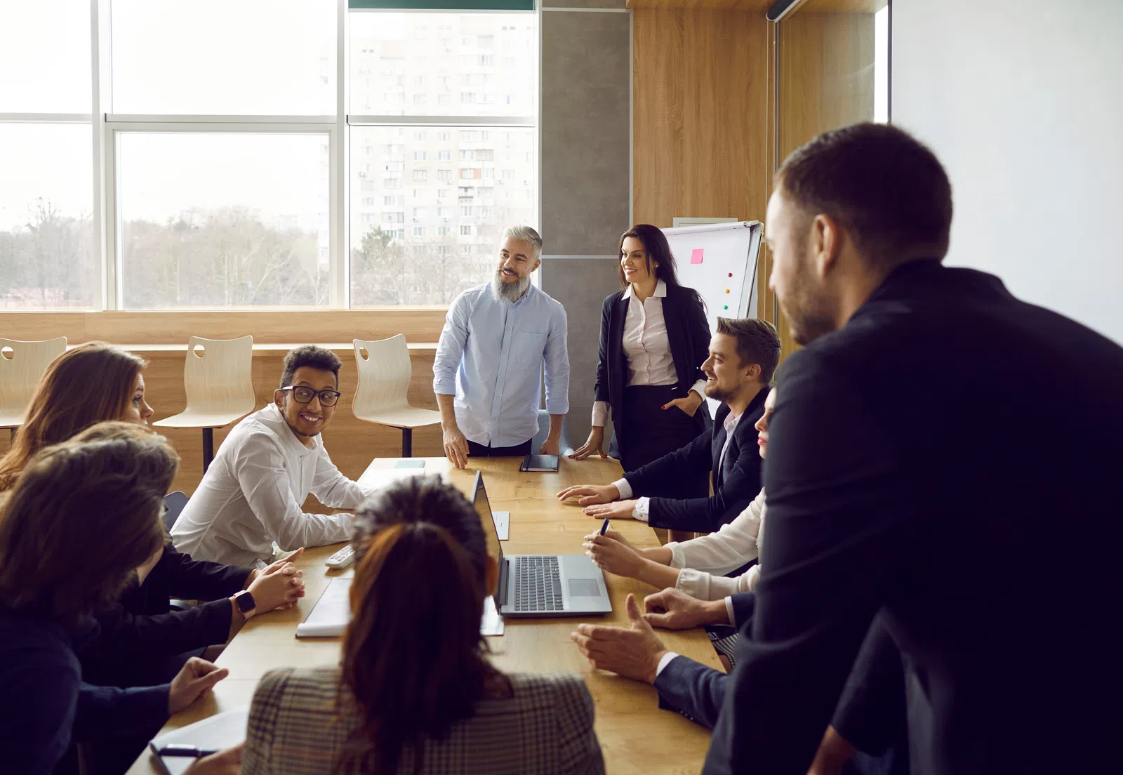 a group of people in a meeting