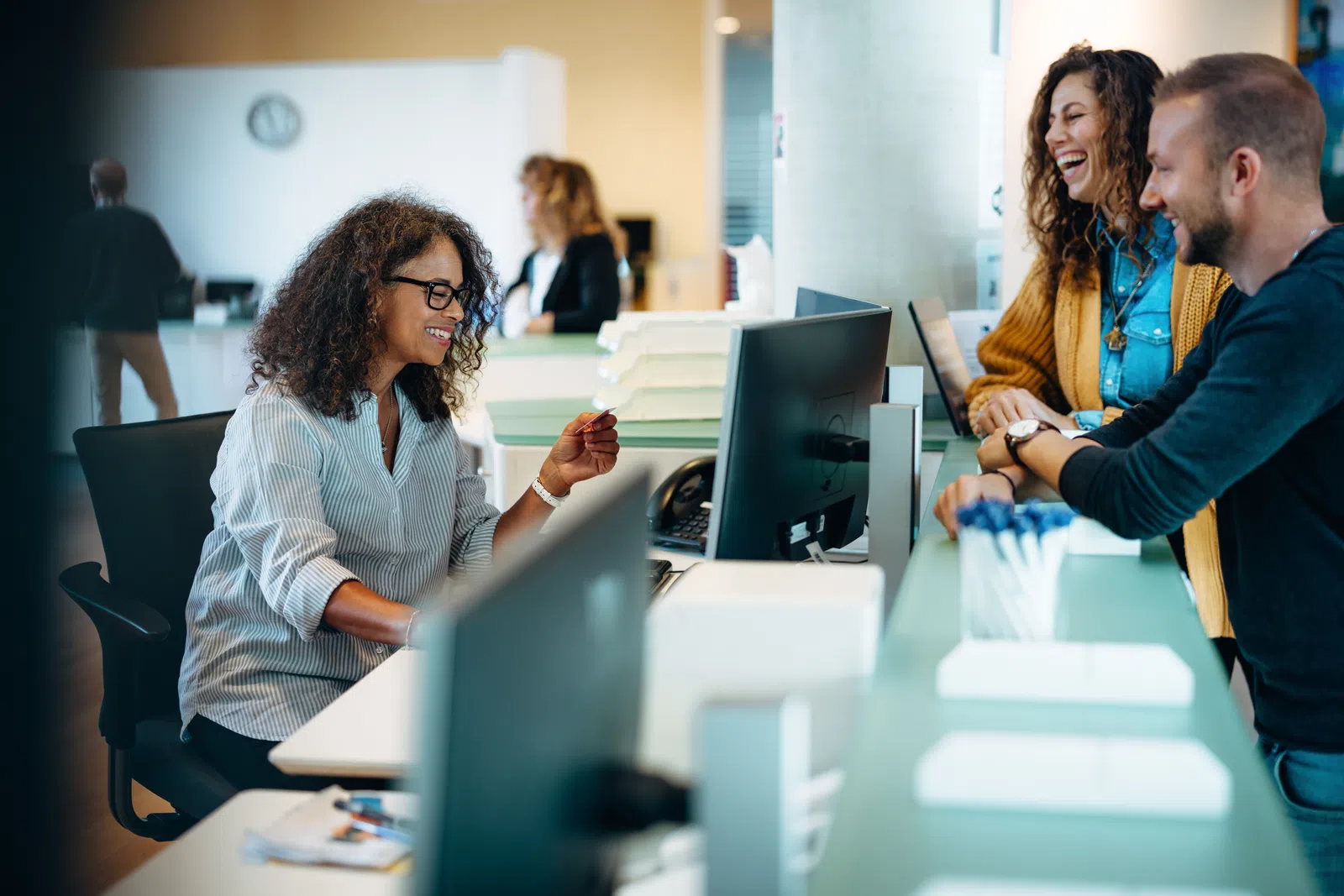 a group of people in an office